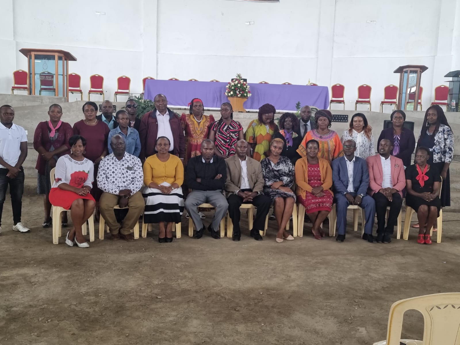 a group of people posing for a photo